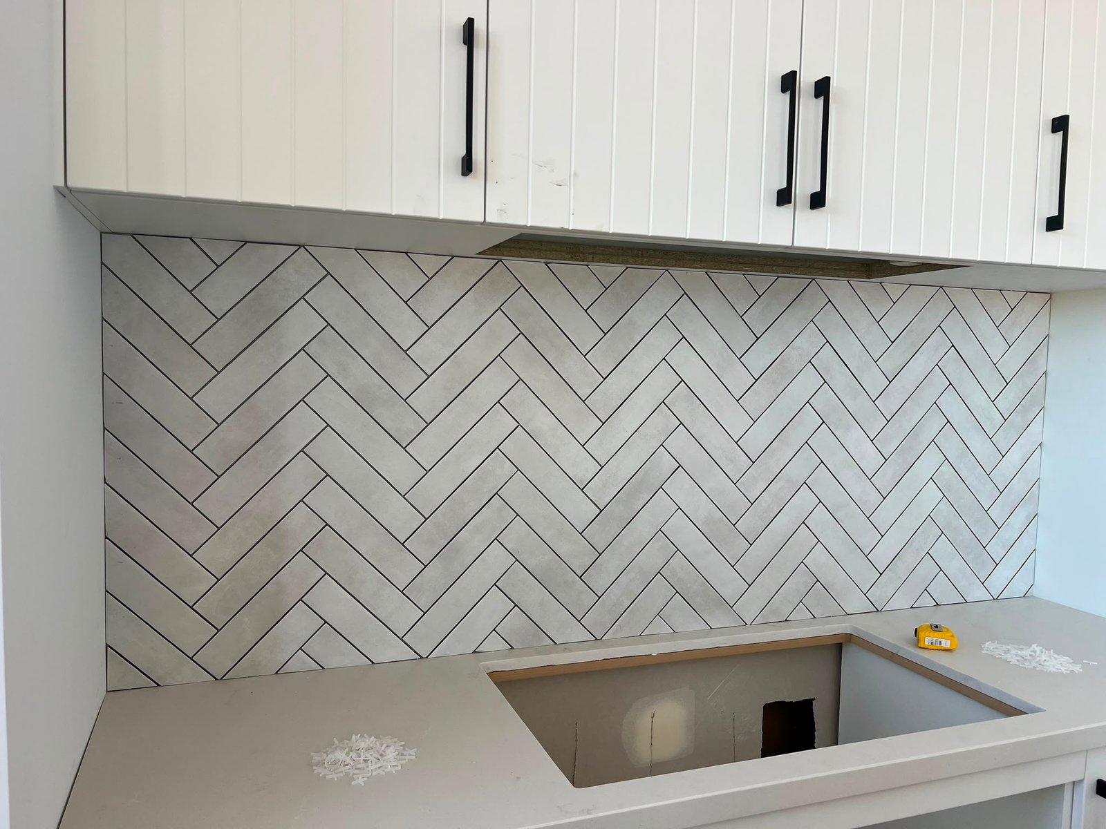 Installing tiles and mosaic to floors and walls