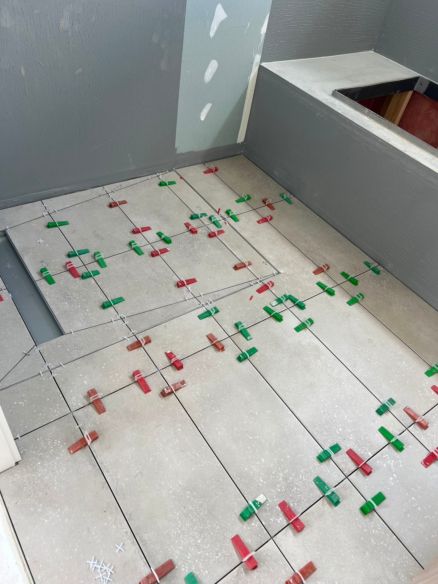 Bathroom floor screeding and falls preparation